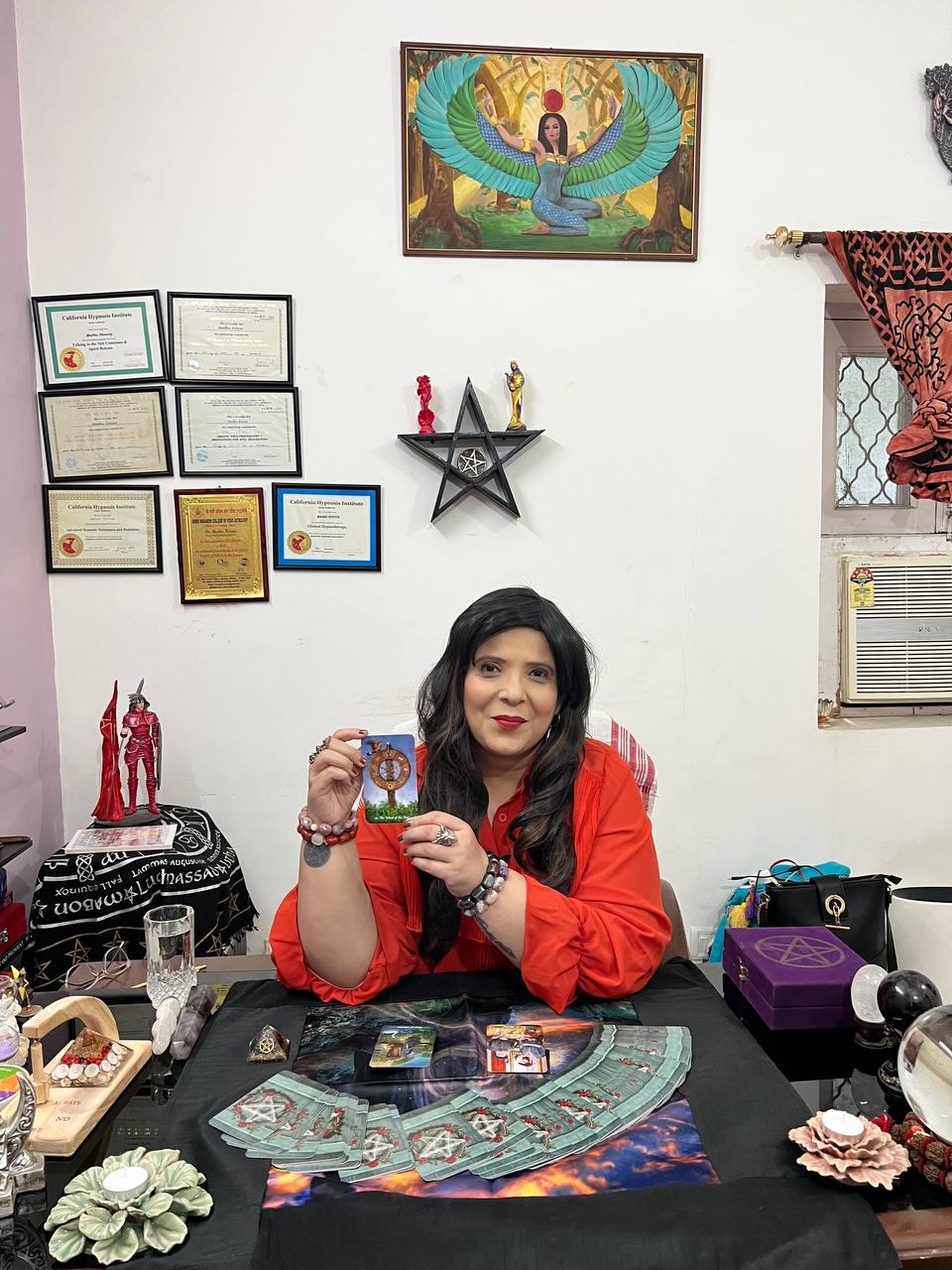 Dr. Madhu Kotiya at her Tarot table